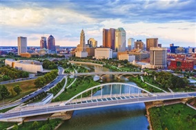Aerial image of downtown Columbus Ohio, the Scioto River, and the Main St Bridge
