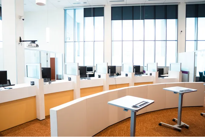 Computer help stations in a sunny office room